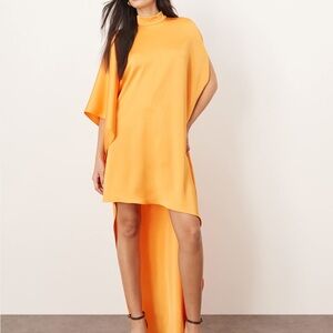 ARRANGE high neck cape sleeve mini dress with asymmetric hem in apricot US 4